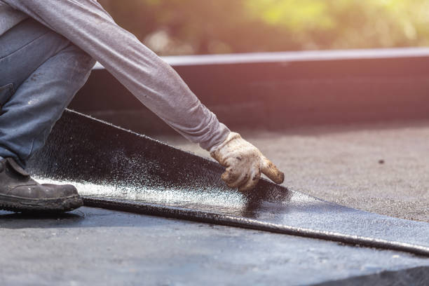 Professional Basement Waterproofing technician working in Hopkins, SC